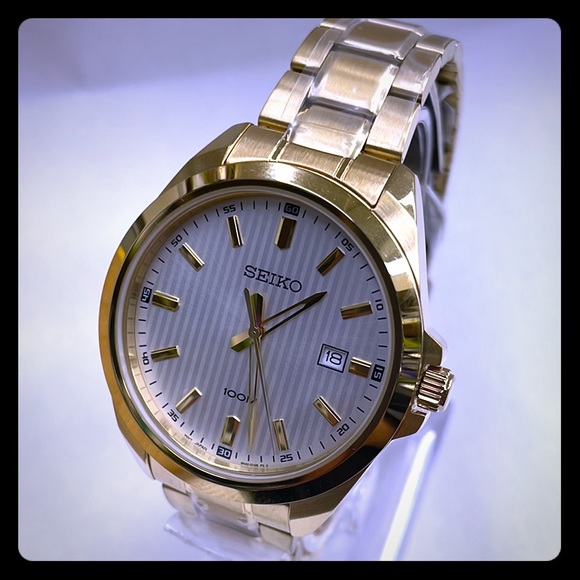New Seiko Quartz Gold Steel White Face Mens Watch